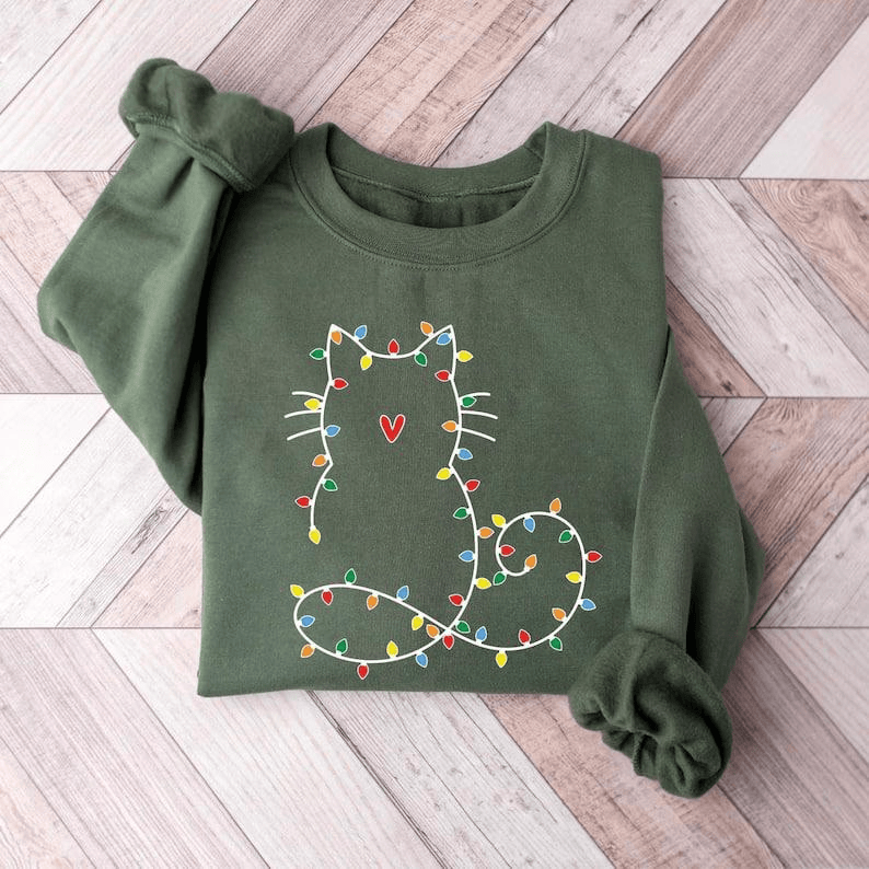 Adorable cat Christmas sweatshirt for women, perfect gift for cat lovers, featuring festive holiday design and cute Xmas graphic for cozy winter days